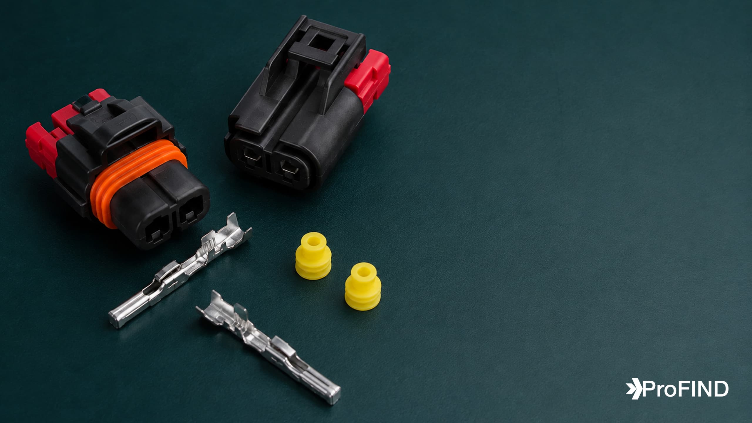 Black two-way sealed connectors with red locks, yellow wire seals, and stamped terminals